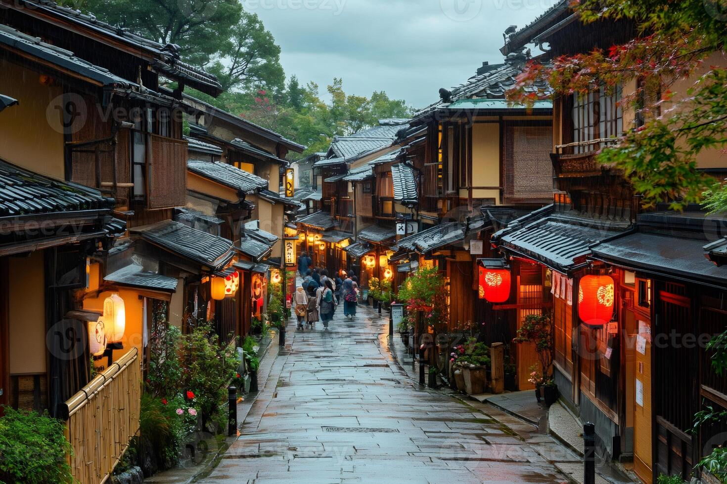 Tourists walking in the atmospheric streets of Gion, Kyoto, during a rainy evening photo