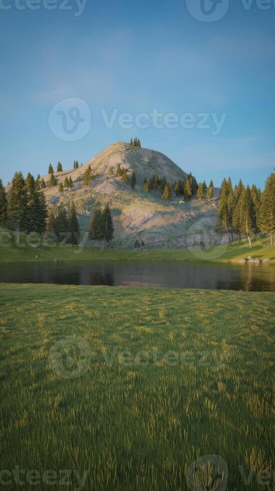 A mountain with a lake and trees in the background photo