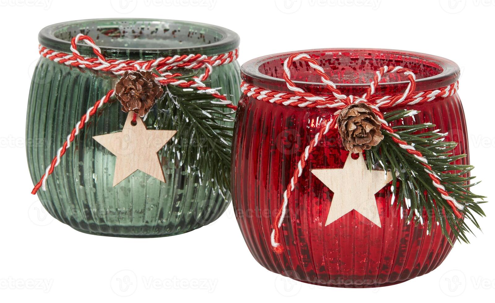 party candle glass Red Christmas leaves with stars cut out isolated white background with clipping path photo