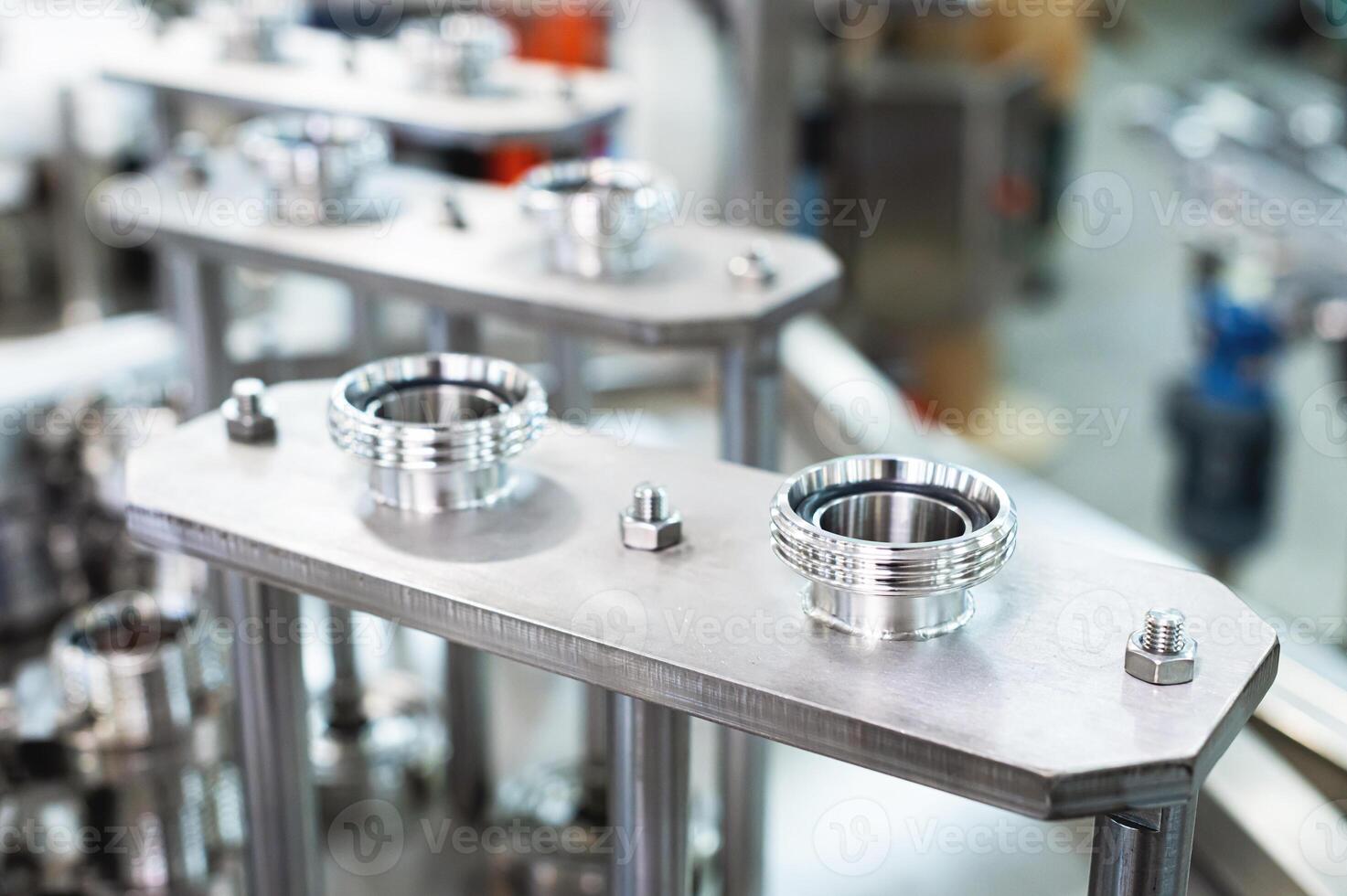Close-up of mechanical pneumatic equipment elements in manufacturing equipment production photo
