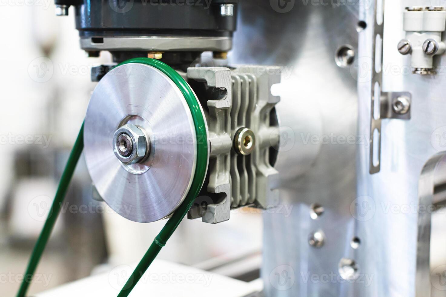 Close-up of mechanical pneumatic equipment elements in manufacturing equipment production photo
