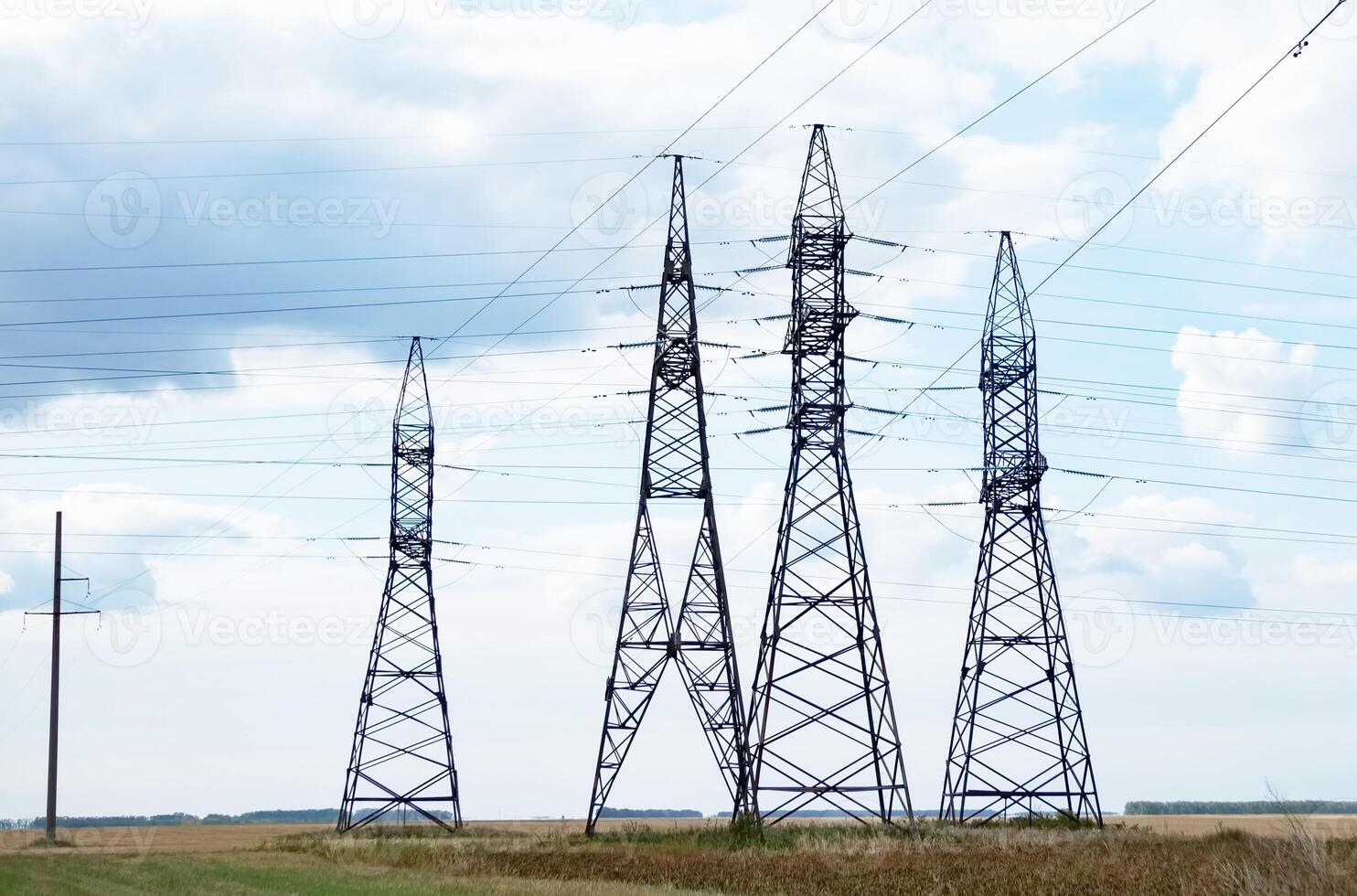 Silhouette High voltage electric tower On a sunny day on sunset time and sky on sunset time background. photo