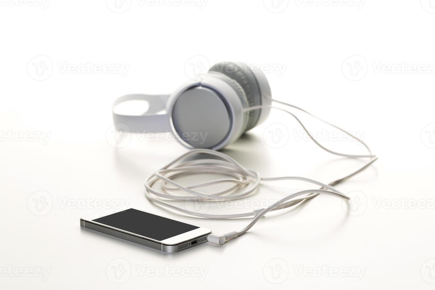 White headphones on white background close up photo