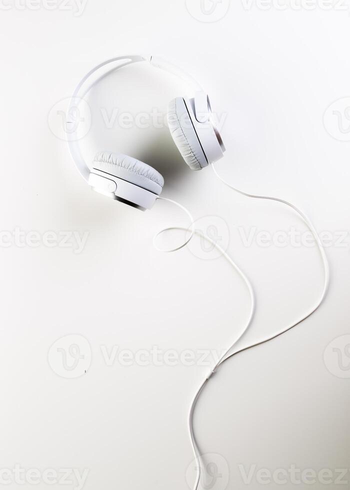 White headphones on white background close up photo