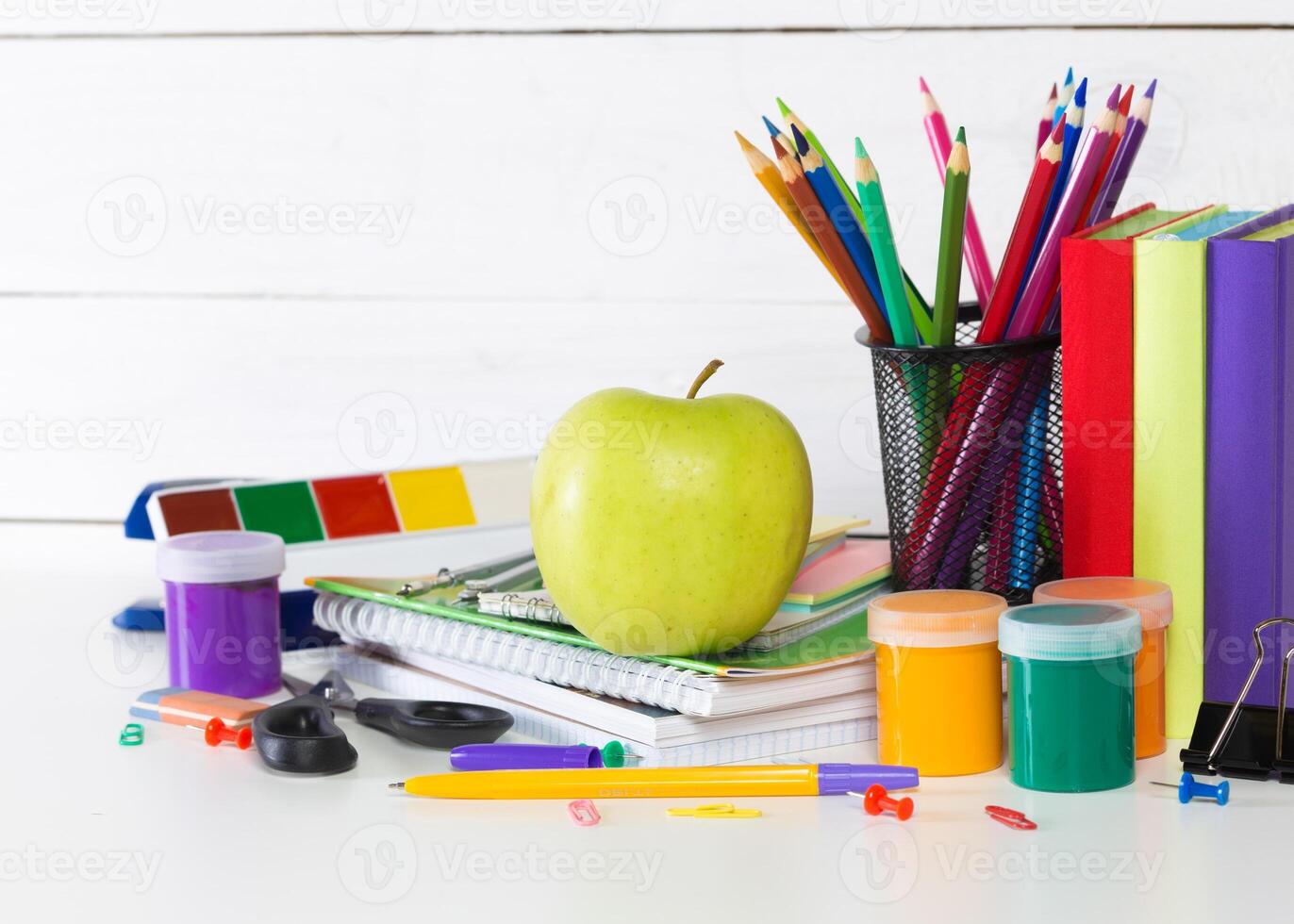 Drawing supplies on white table close up photo