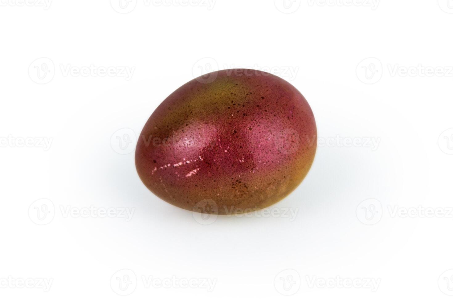 Golden brown easter egg with glowing shell pattern, isolated on white background. Color contrast, creativity, holiday decoration, creativity, symbolism of rebirth. Copy space. Selective focus 2 photo