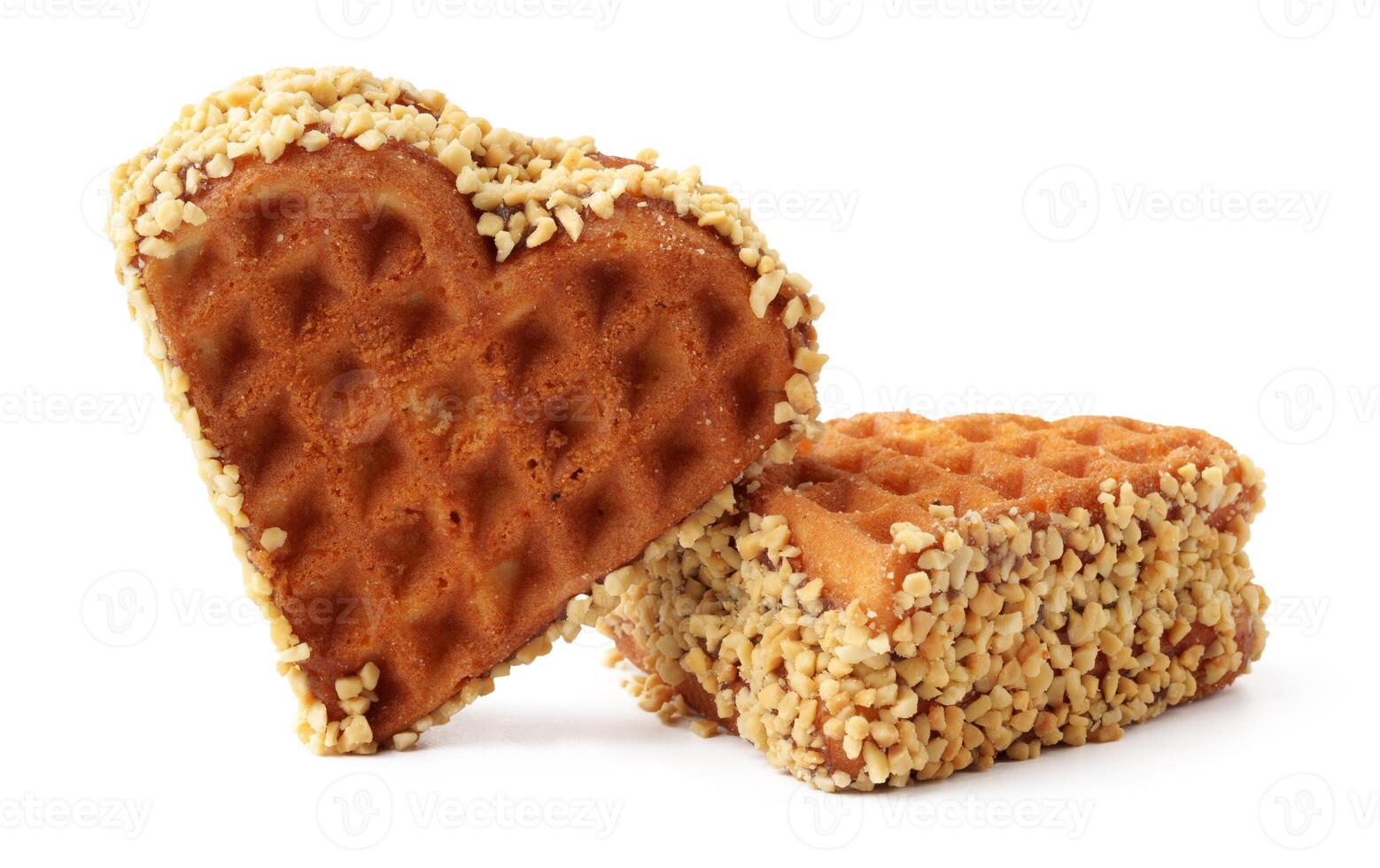 Delicious heart-shaped waffle treats covered in crushed nuts perfect for sharing at any gathering photo