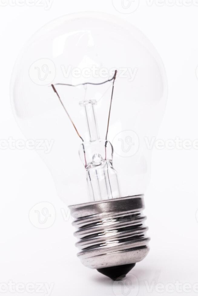 Close up of a light bulb on white background photo