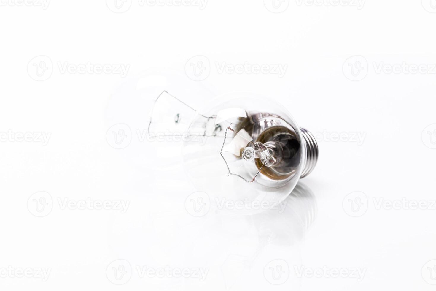 Close up of a light bulb on white background photo