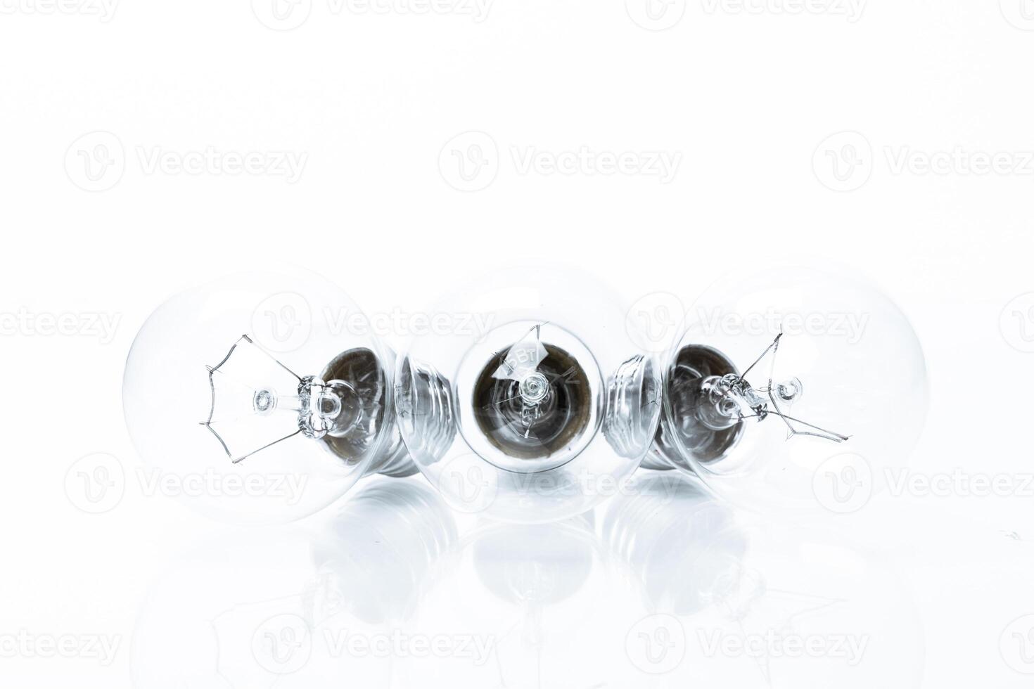 Many lightbulbs on white background close up photo
