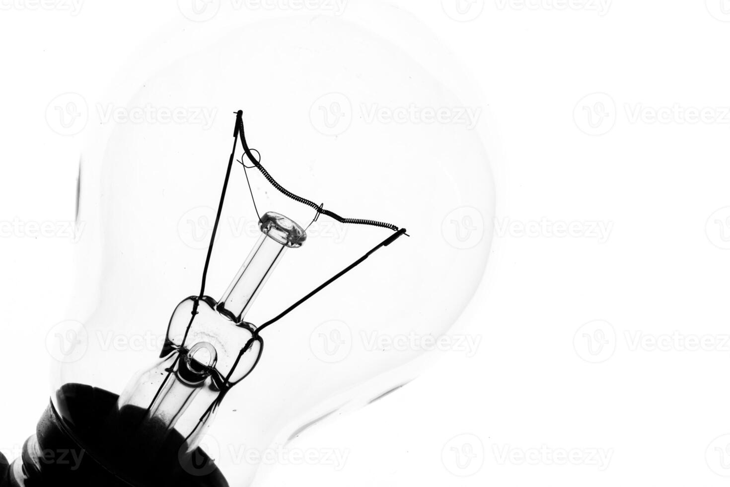 Lightbulb on white background, close up shot photo