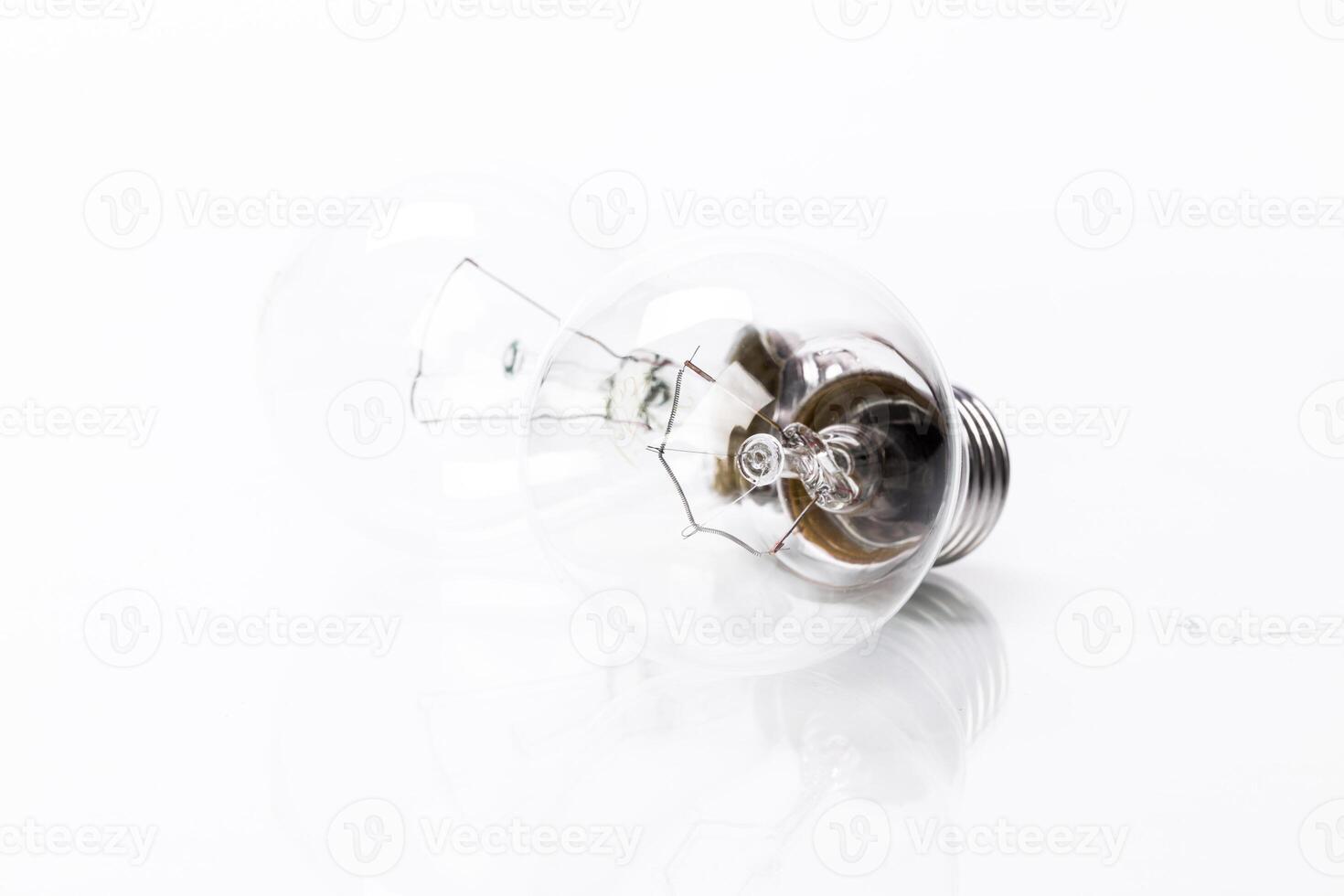 Close up of a light bulb on white background photo