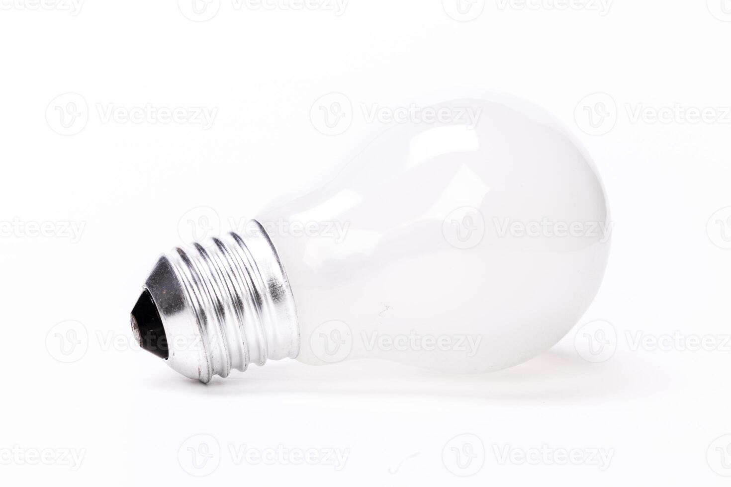Close up of a light bulb on white background photo