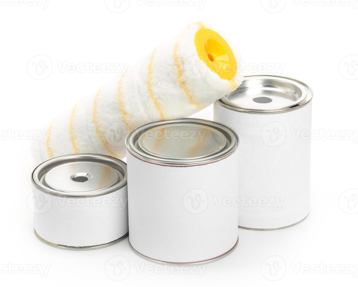 White tin cans with paint isolated on white background, copy space photo