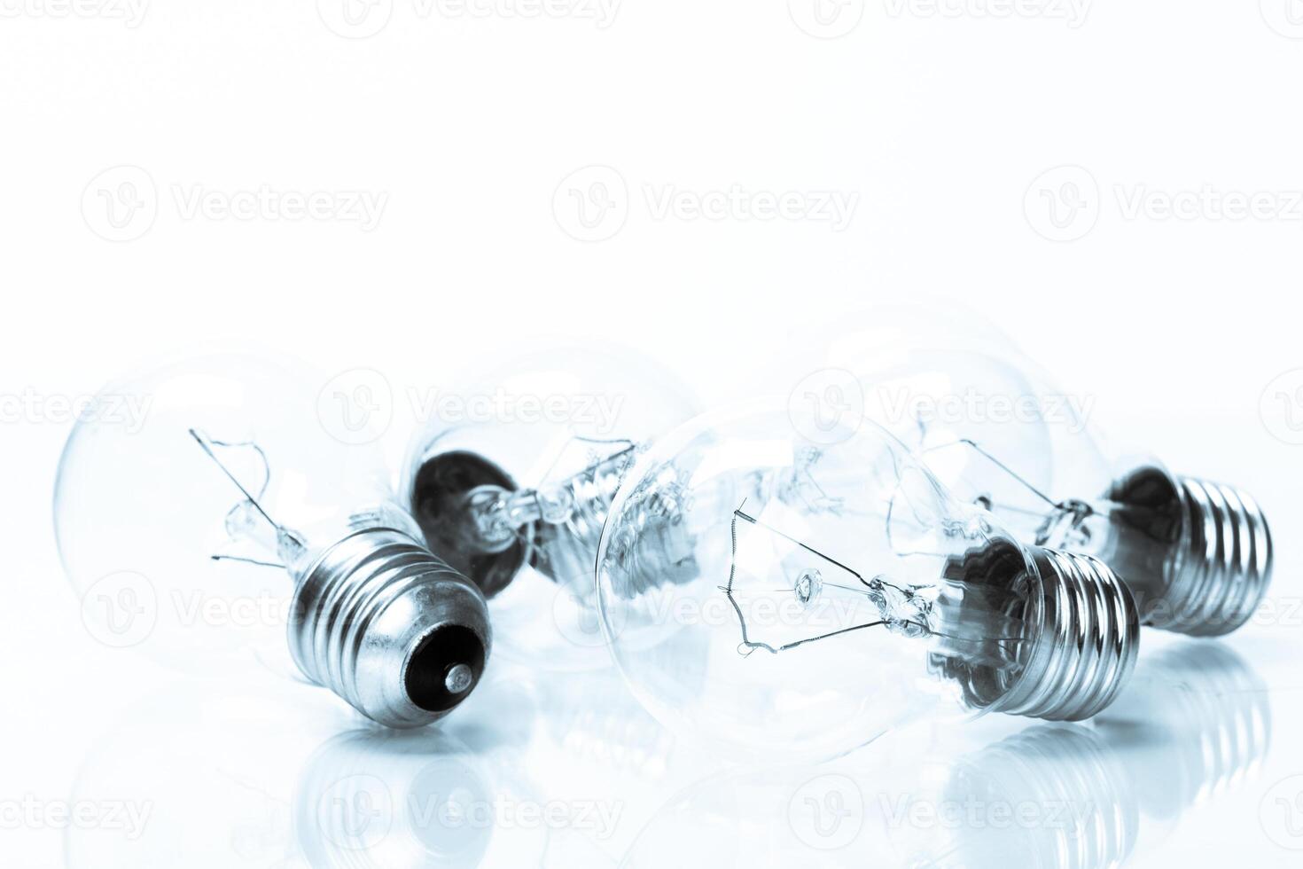 Many lightbulbs on white background close up photo