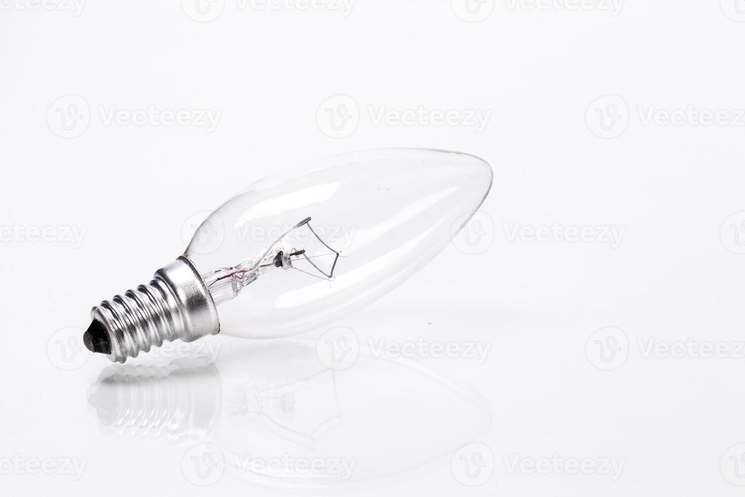 Close up of a light bulb on white background photo