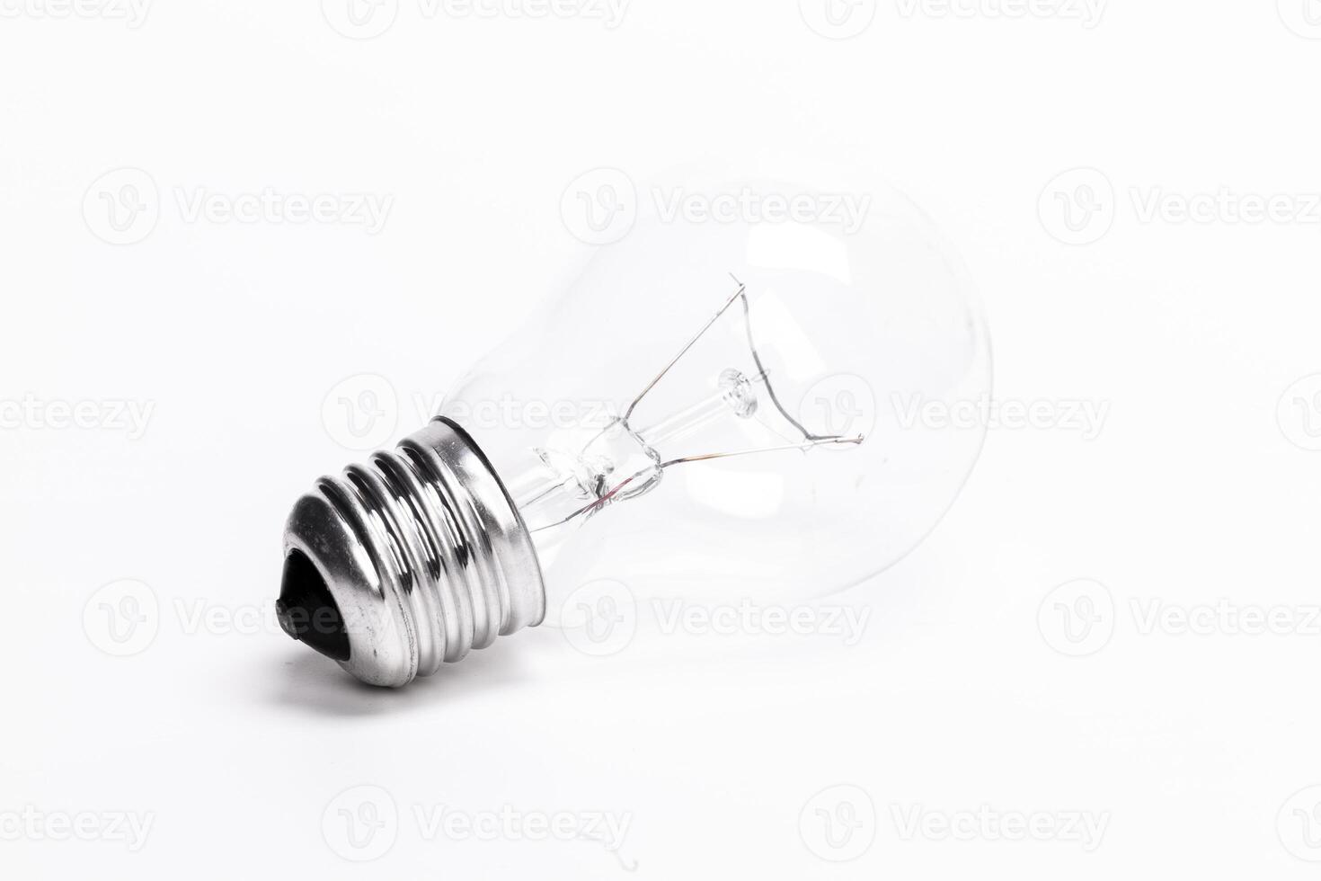 Close up of a light bulb on white background photo