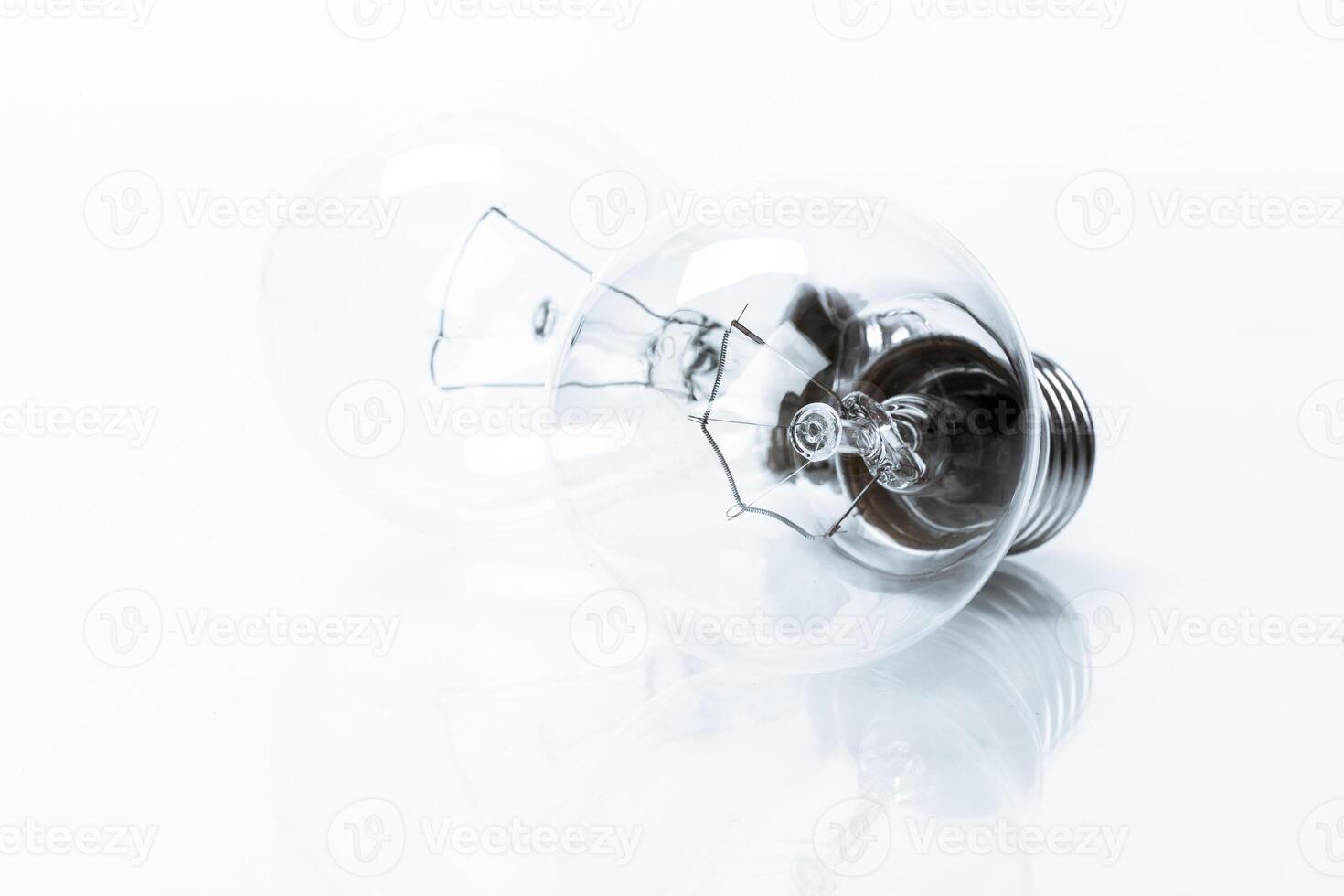 Close up of a light bulb on white background photo