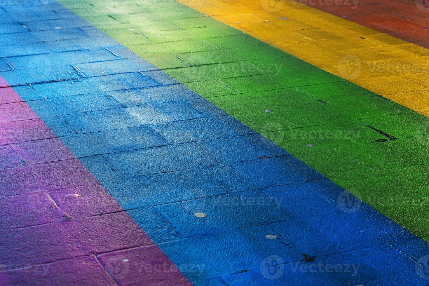 Vibrant rainbow colored path. Regenboogvlag on Grote Marktstraat in the Hague, Netherlands. Diversity, equality, inclusion, street art, and lgbtq pride concept. Copy space. Selective focus 1 photo