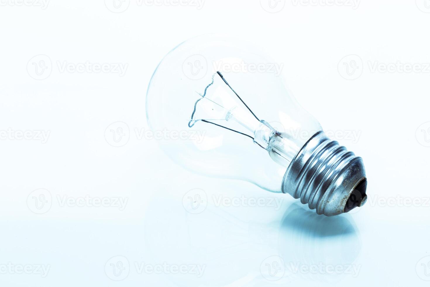 Close up of a light bulb on white background photo