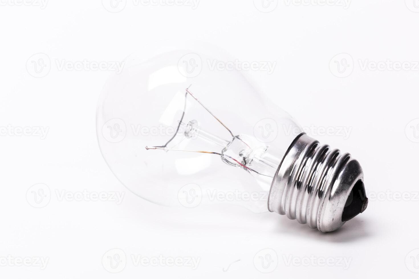 Close up of a light bulb on white background photo