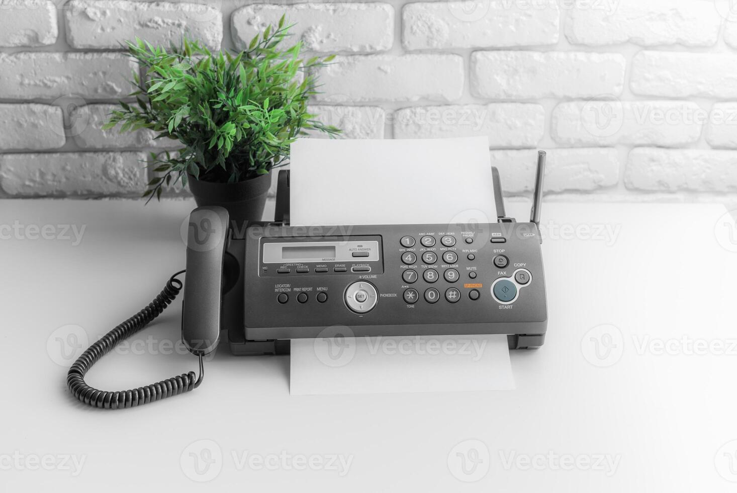 Fax machine close up in an office photo