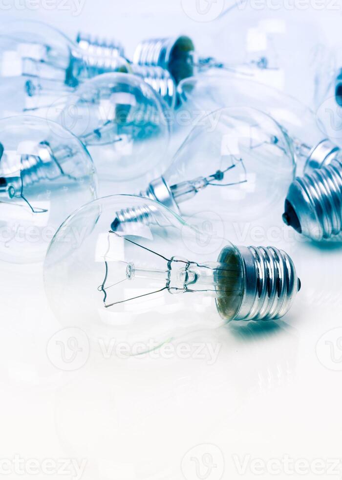 Many lightbulbs on white background close up photo