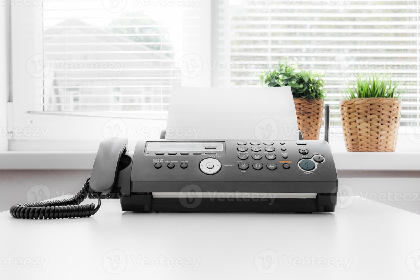 Black fax machine tool close up, business concept photo
