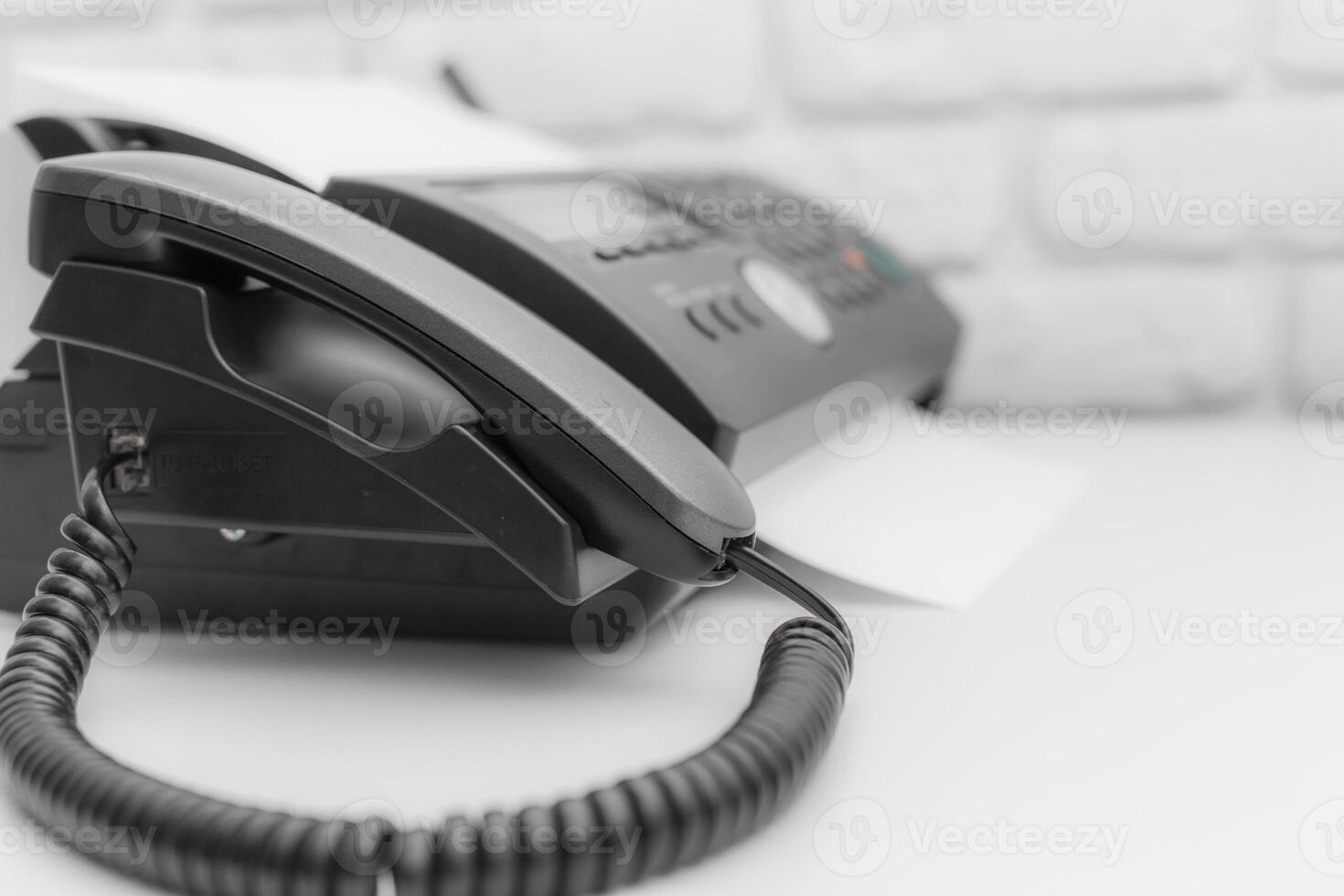 Fax machine, office equipment on white table photo