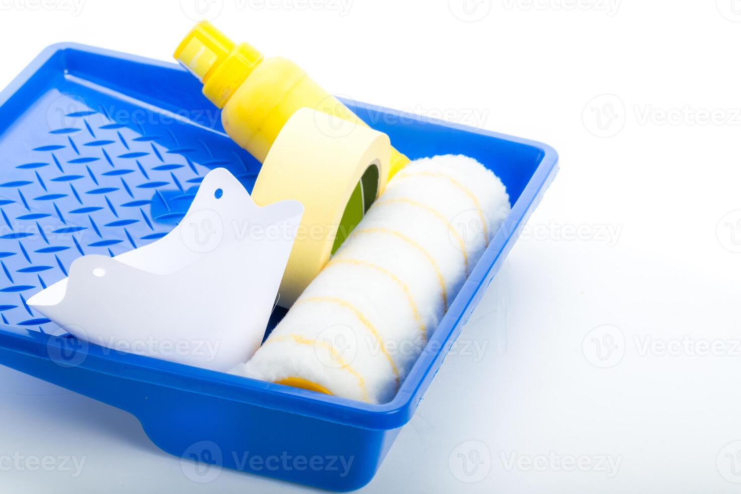 Paint in bottles and accessories on white background photo