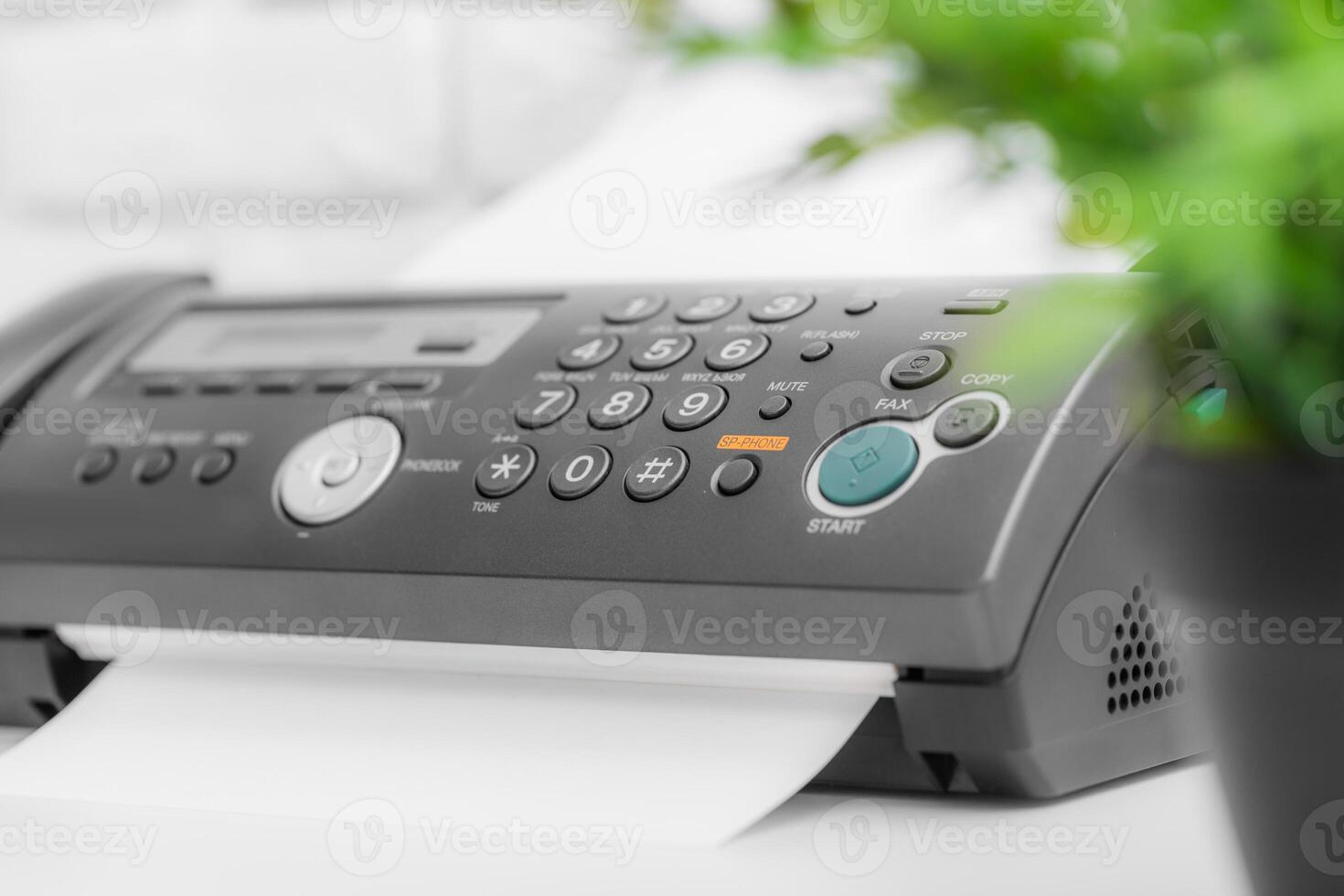 Fax machine, office equipment on white table photo