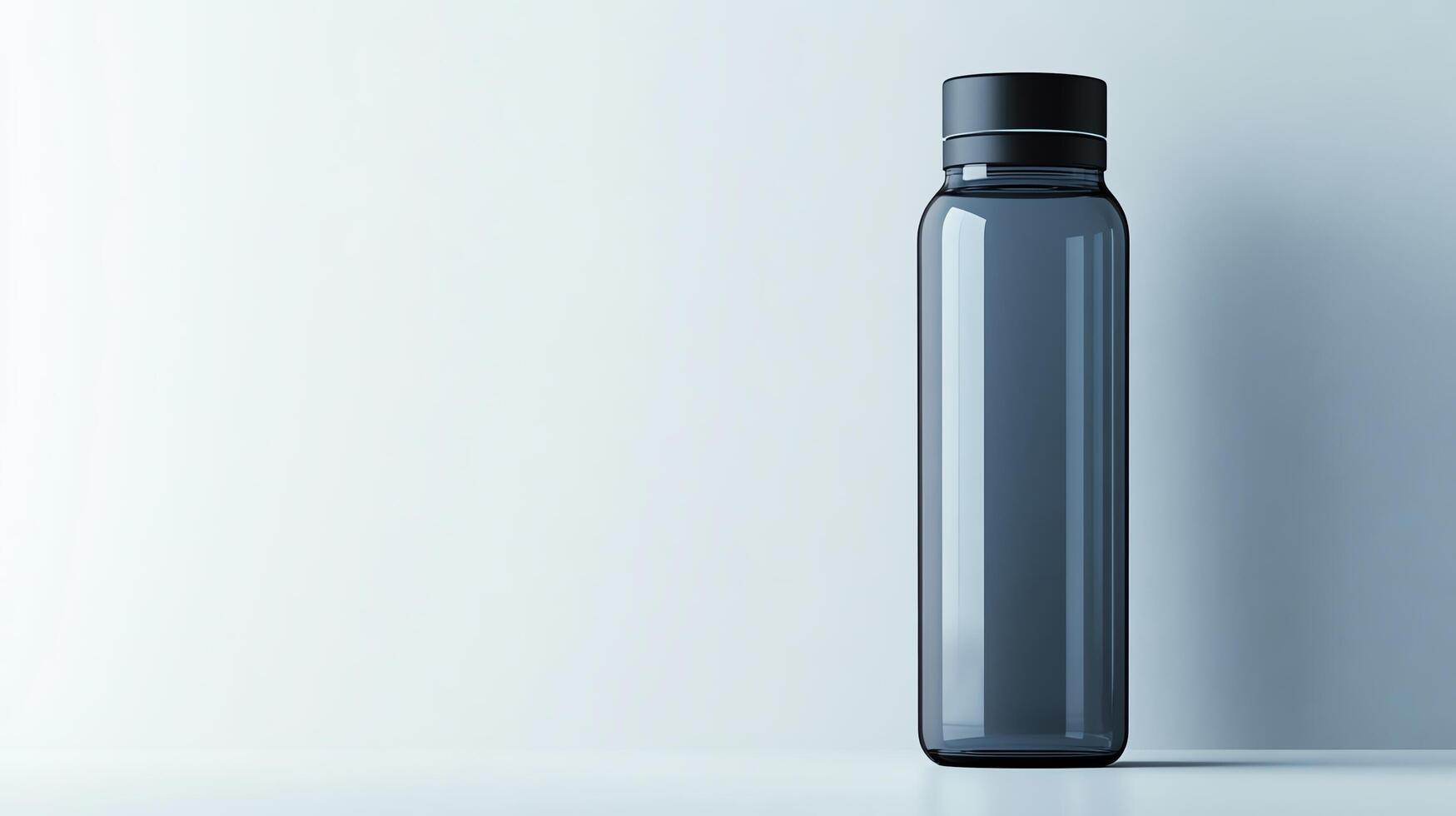 Sleek black water bottle against a minimal backdrop. photo