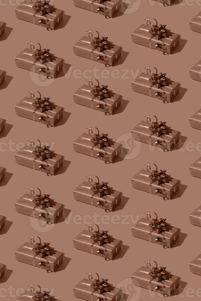 Pattern made from gift boxes mocha mousse trendy 2025 new year colour photo