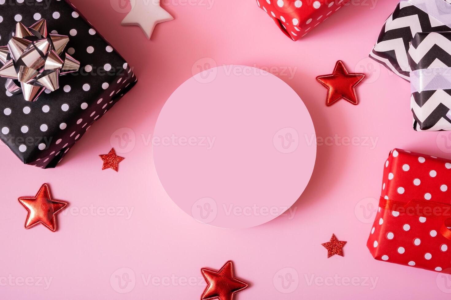 Product podium for Christmas, New year and sale event concept. Gift boxes with ribbon bow and podium photo