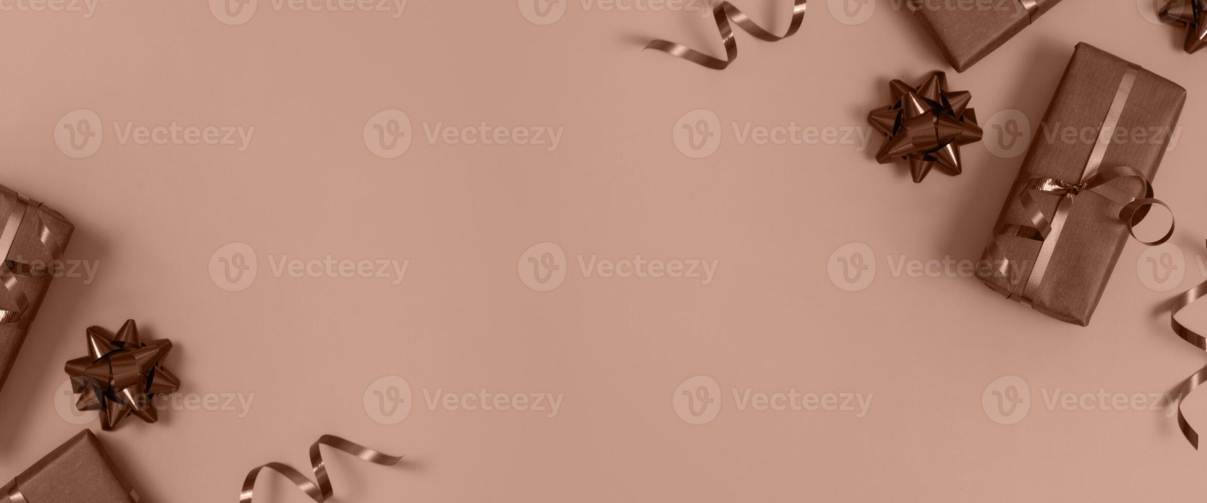 Christmas new year banner gift boxes on mocha mousse colour background photo