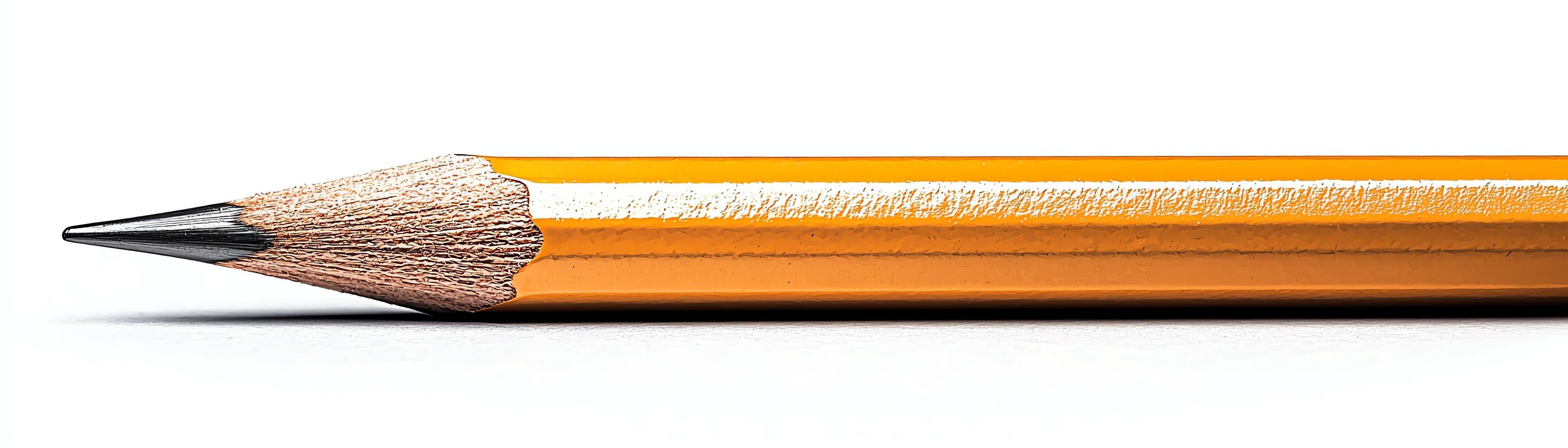 Close-up of a sharpened orange pencil on a clean background. photo