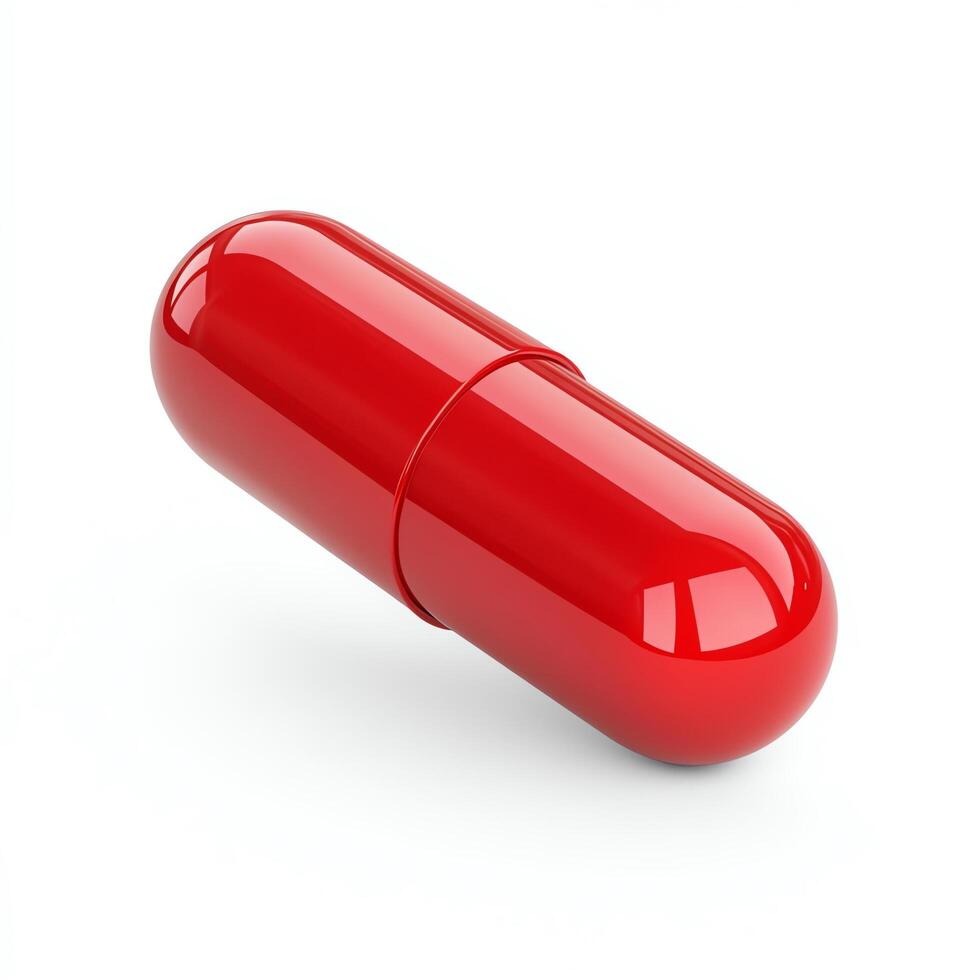 Close-up of a shiny red capsule illustrating medication. photo