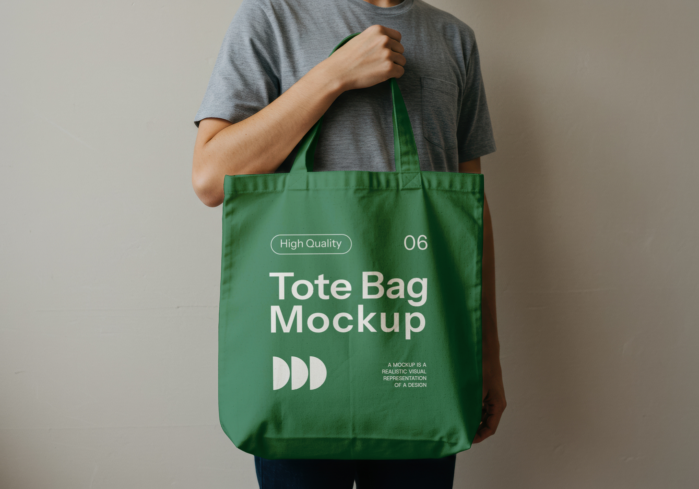 Man holding green tote bag mockup psd