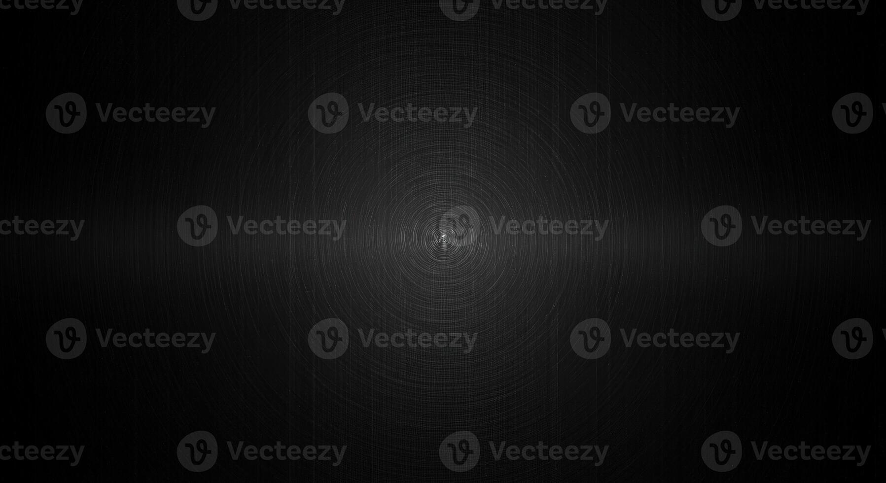 Black background with a spiral pattern photo