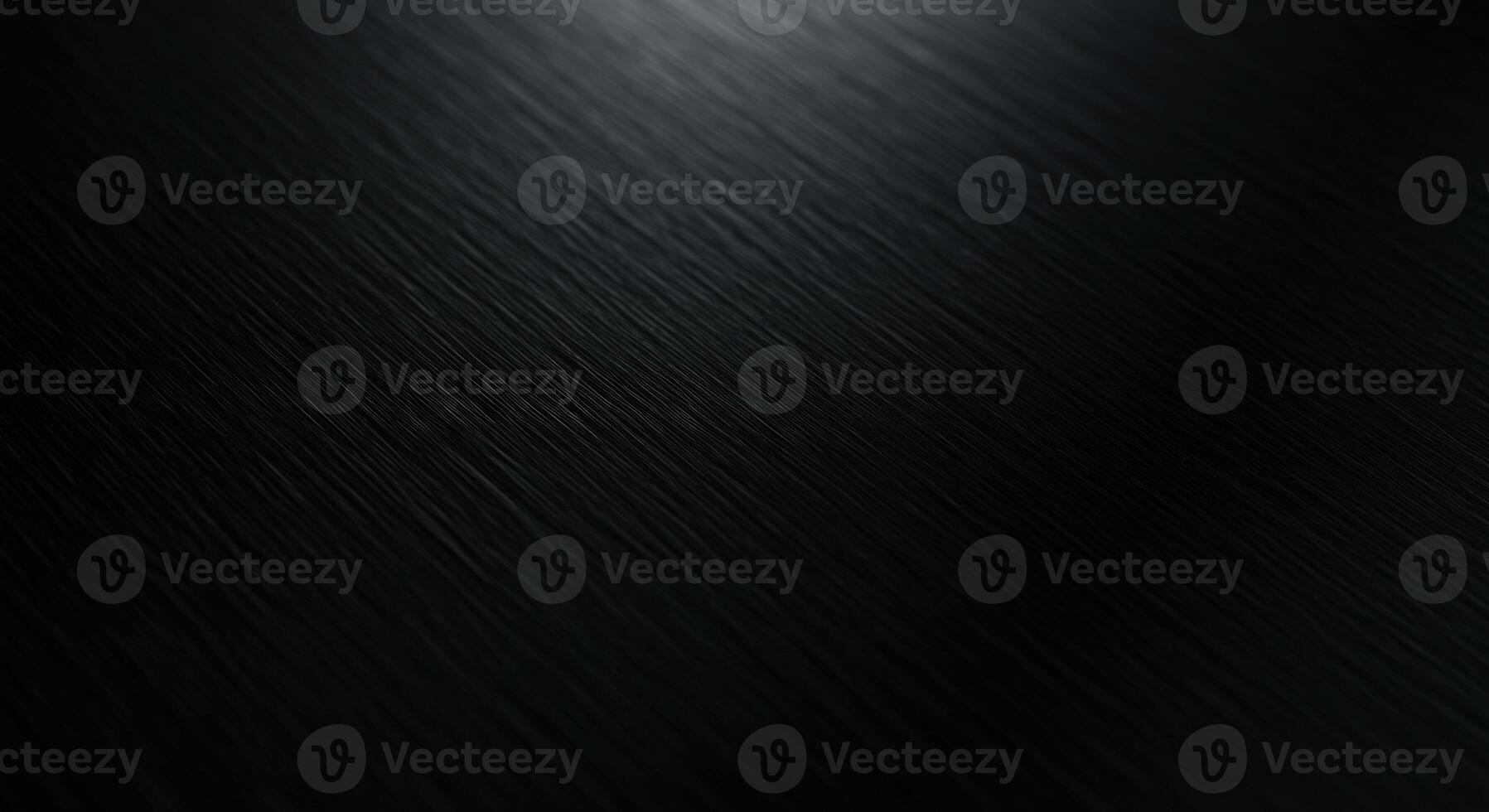 Black metal texture background with a shiny surface photo