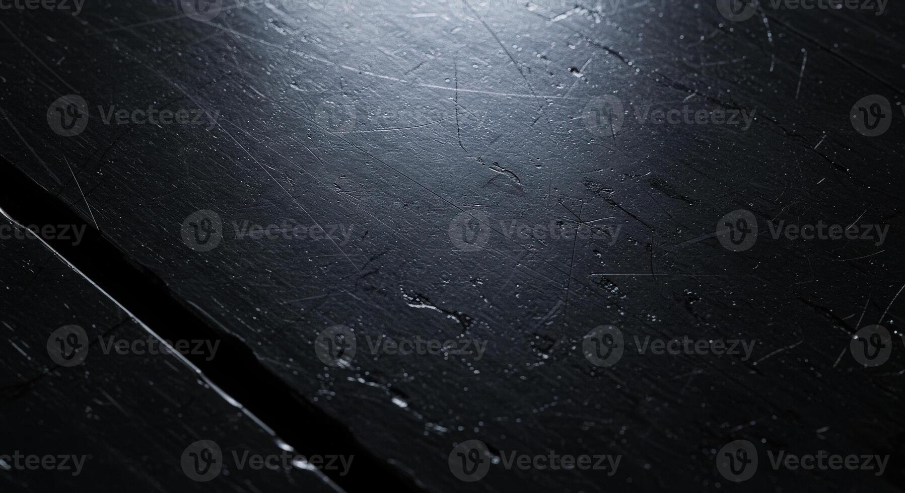 A black background with a light shining on it photo