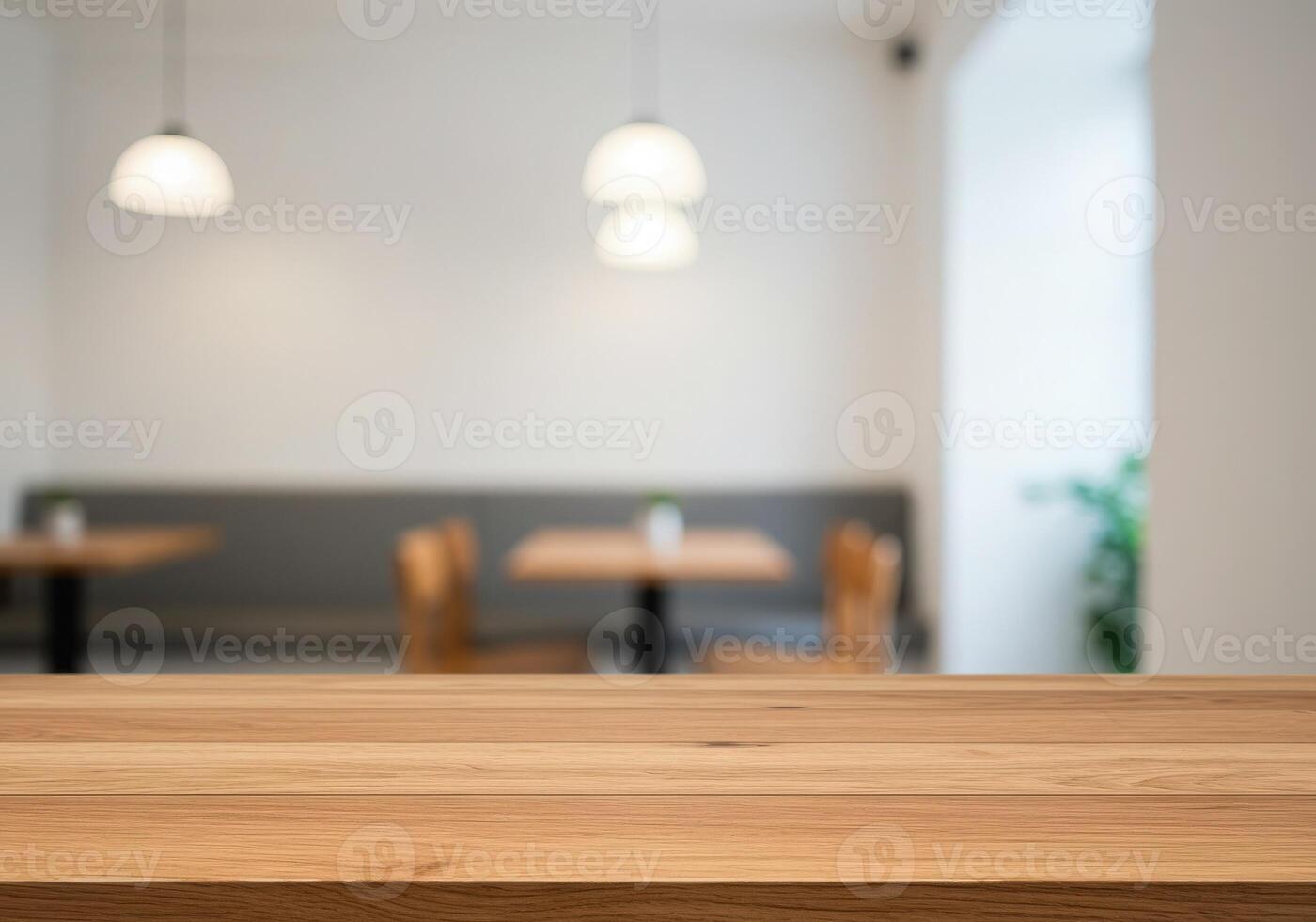 Empty wooden table in a restaurant with wooden chairs photo