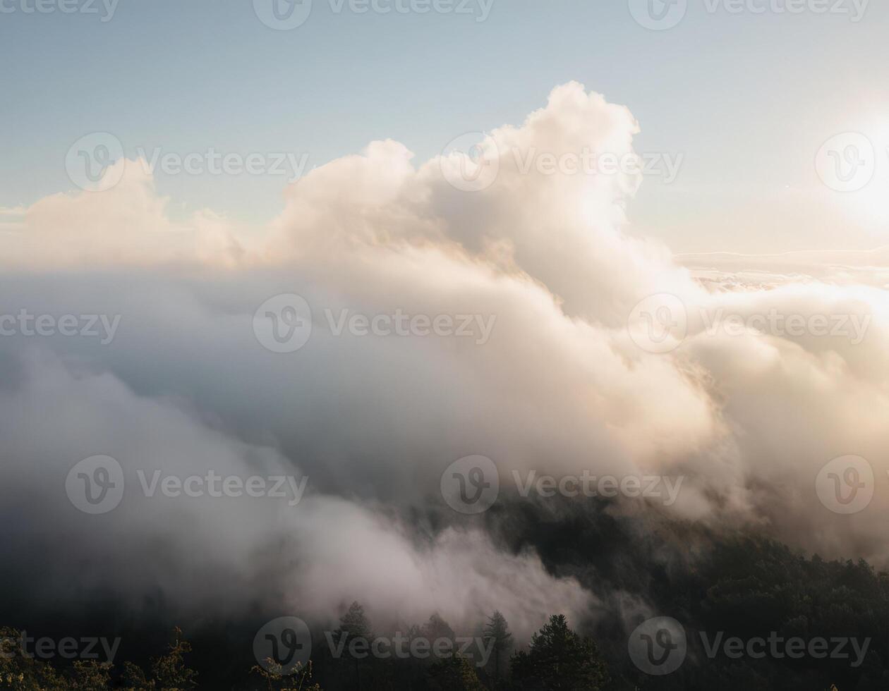 A view of the sun shining through the clouds photo