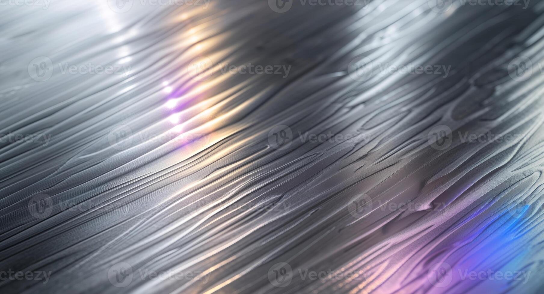A shiny metal surface with a light shining on it photo
