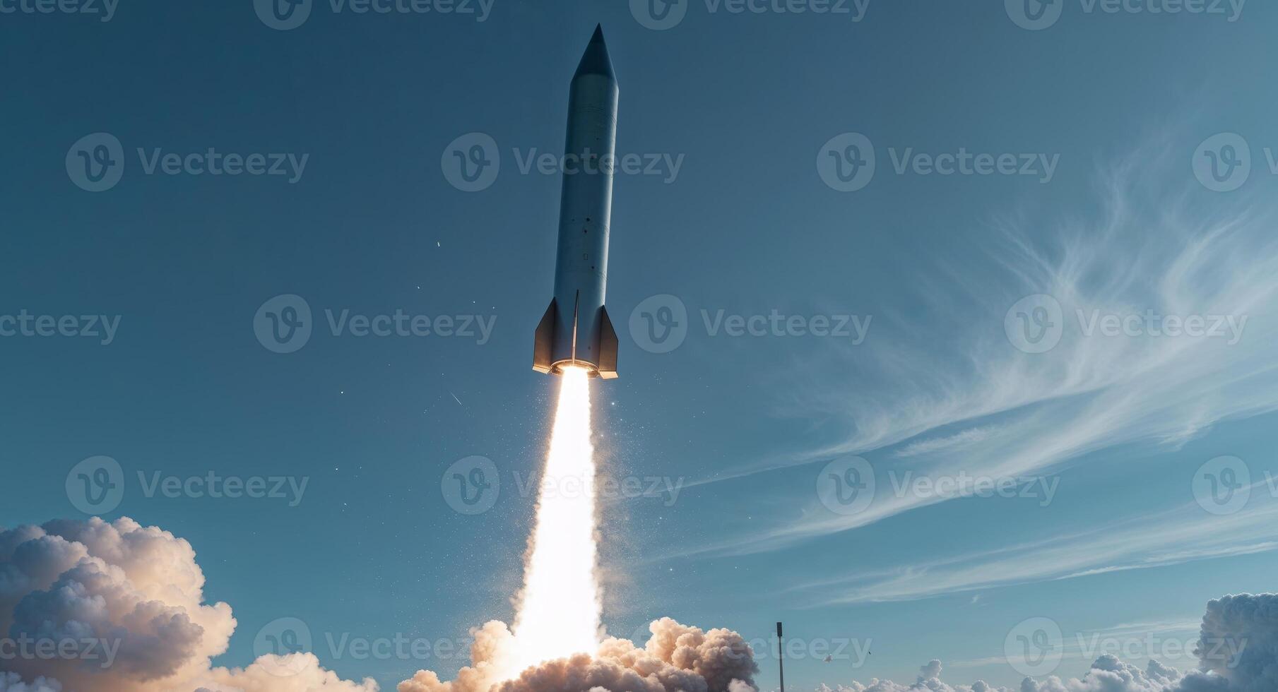 A rocket is taking off into the sky photo