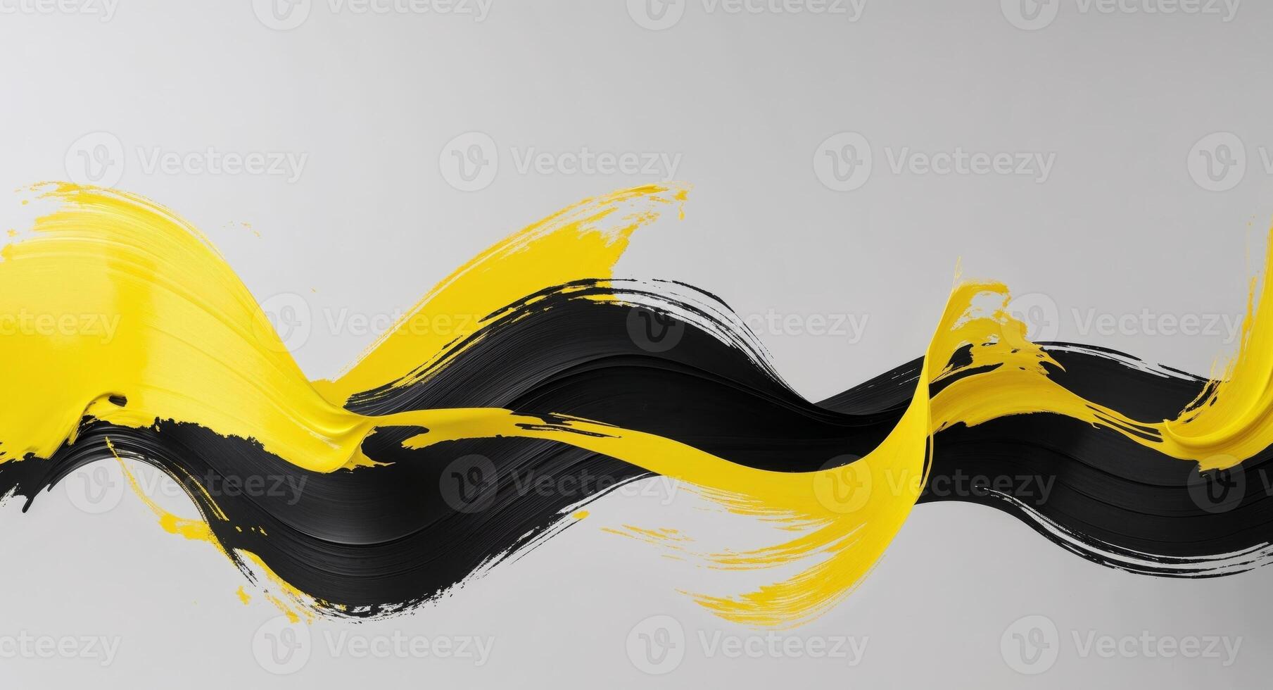 A black and yellow wave of paint on a white background photo