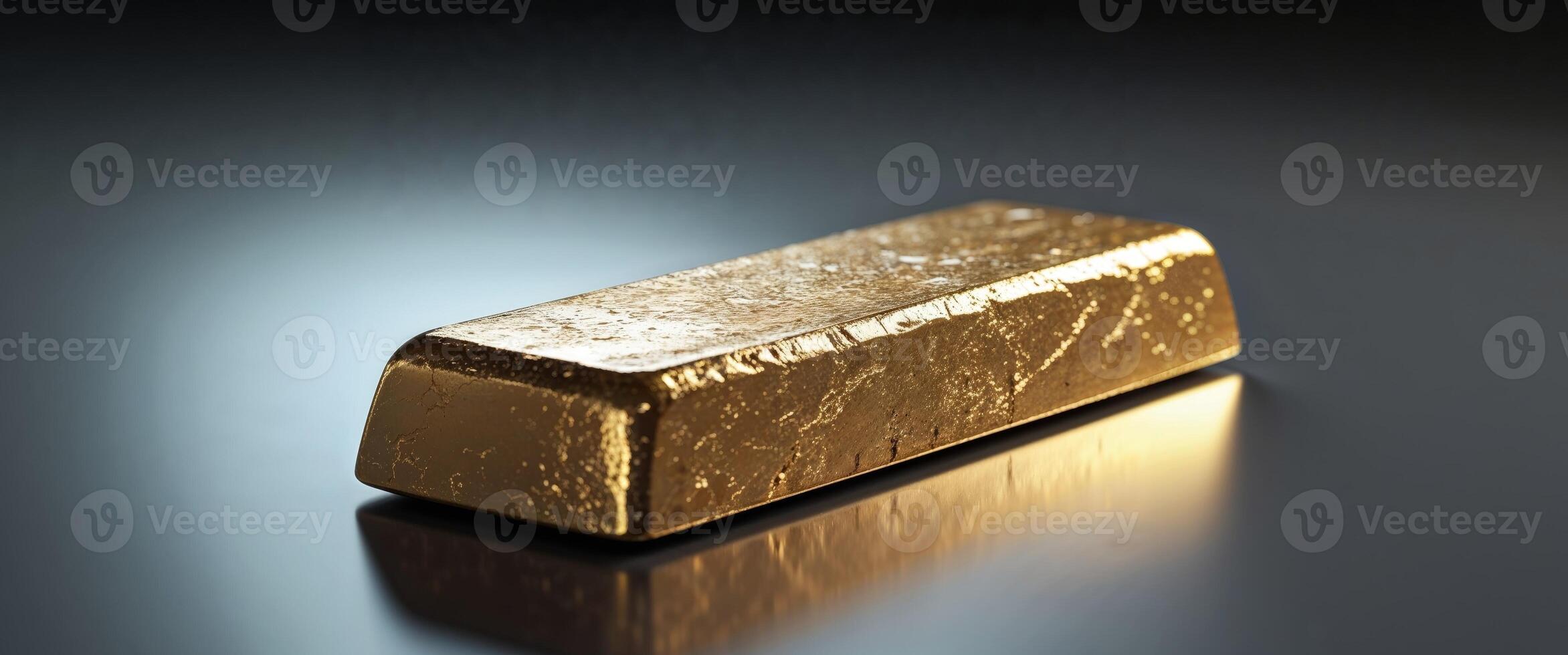 Solid Gold Bar Shining Bright on Reflective Surface Display photo