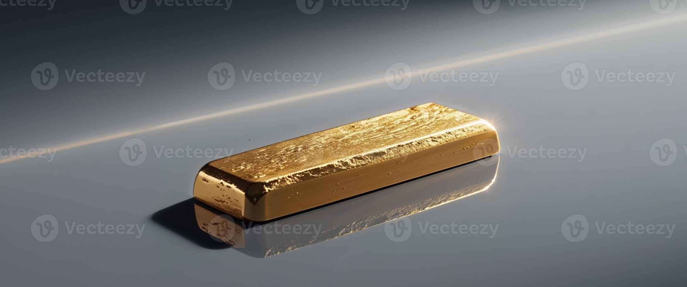Solid Gold Bar Shining Bright on Reflective Surface Display. photo