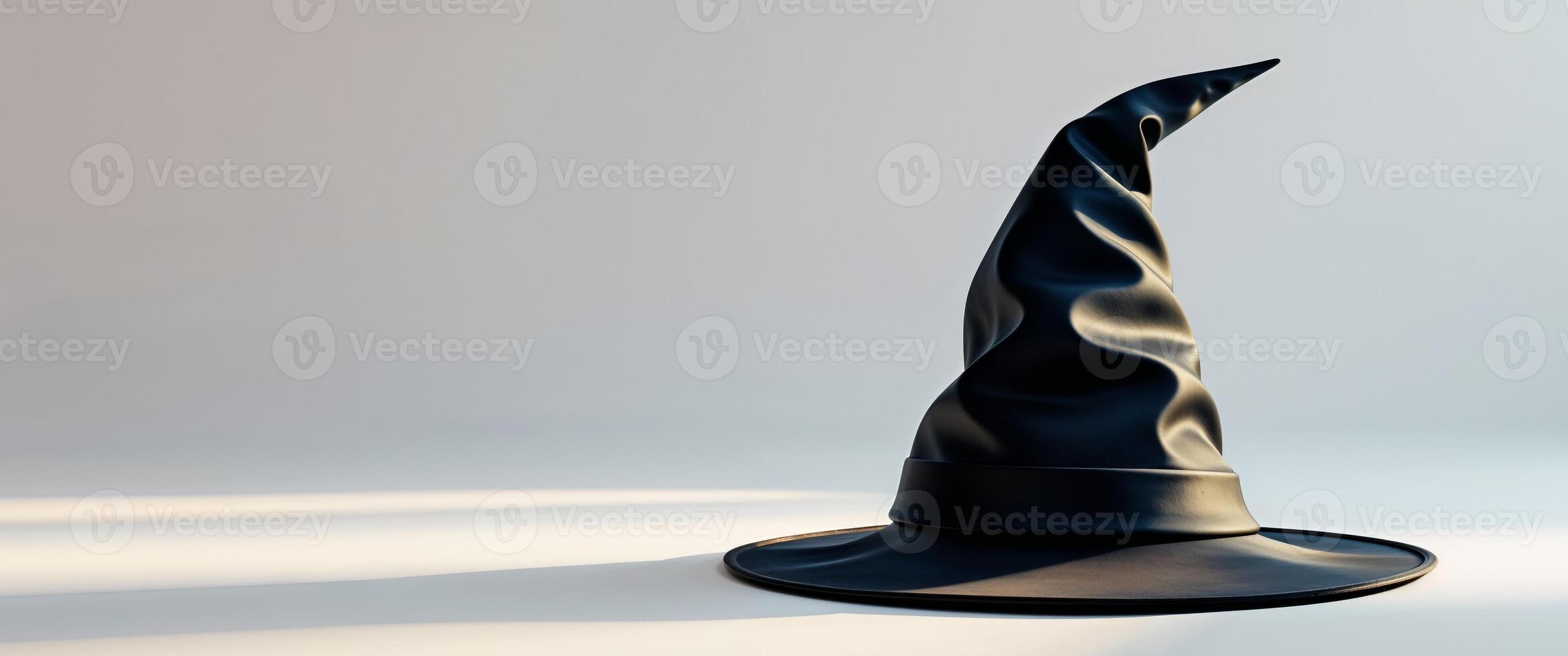 Black wizard hat with a pointed hat on top. photo