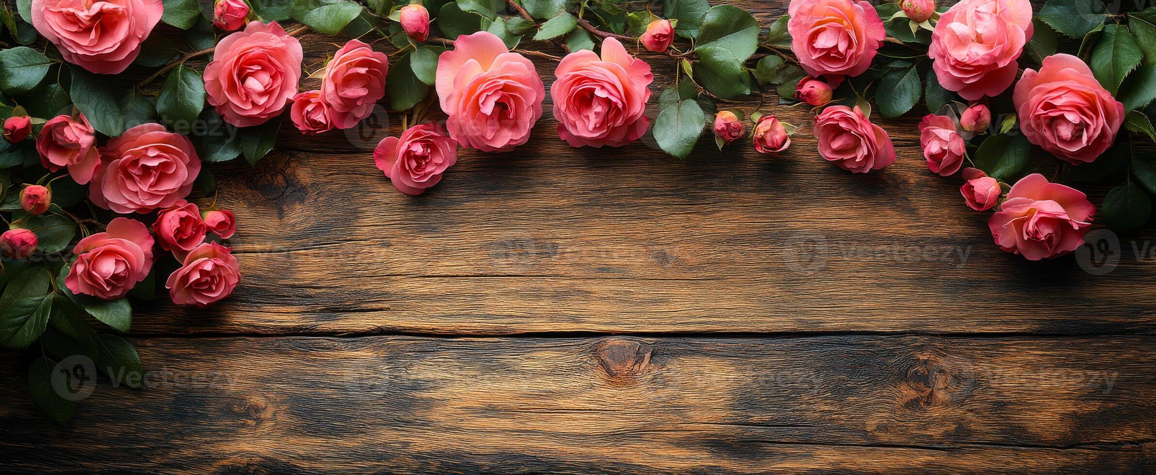 A wooden background with a bunch of red roses on it. The roses are arranged in a way that they are overlapping each other, creating a sense of depth and dimension. Scene is one of beauty and elegance photo